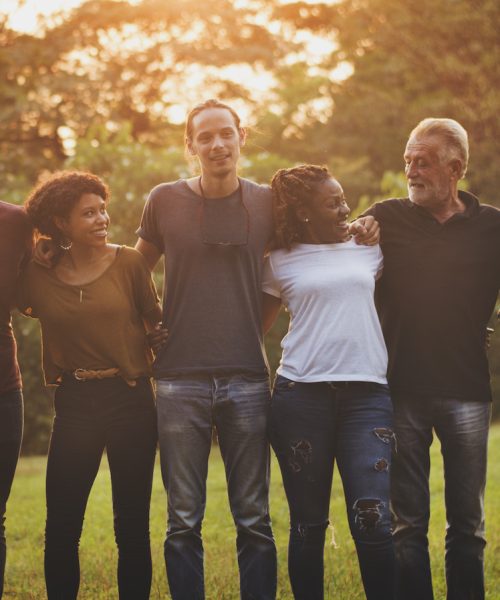 Happiness group of people huddle and smiling together